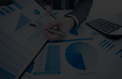 Photo is showing documentation and work on the analysis of investment results
